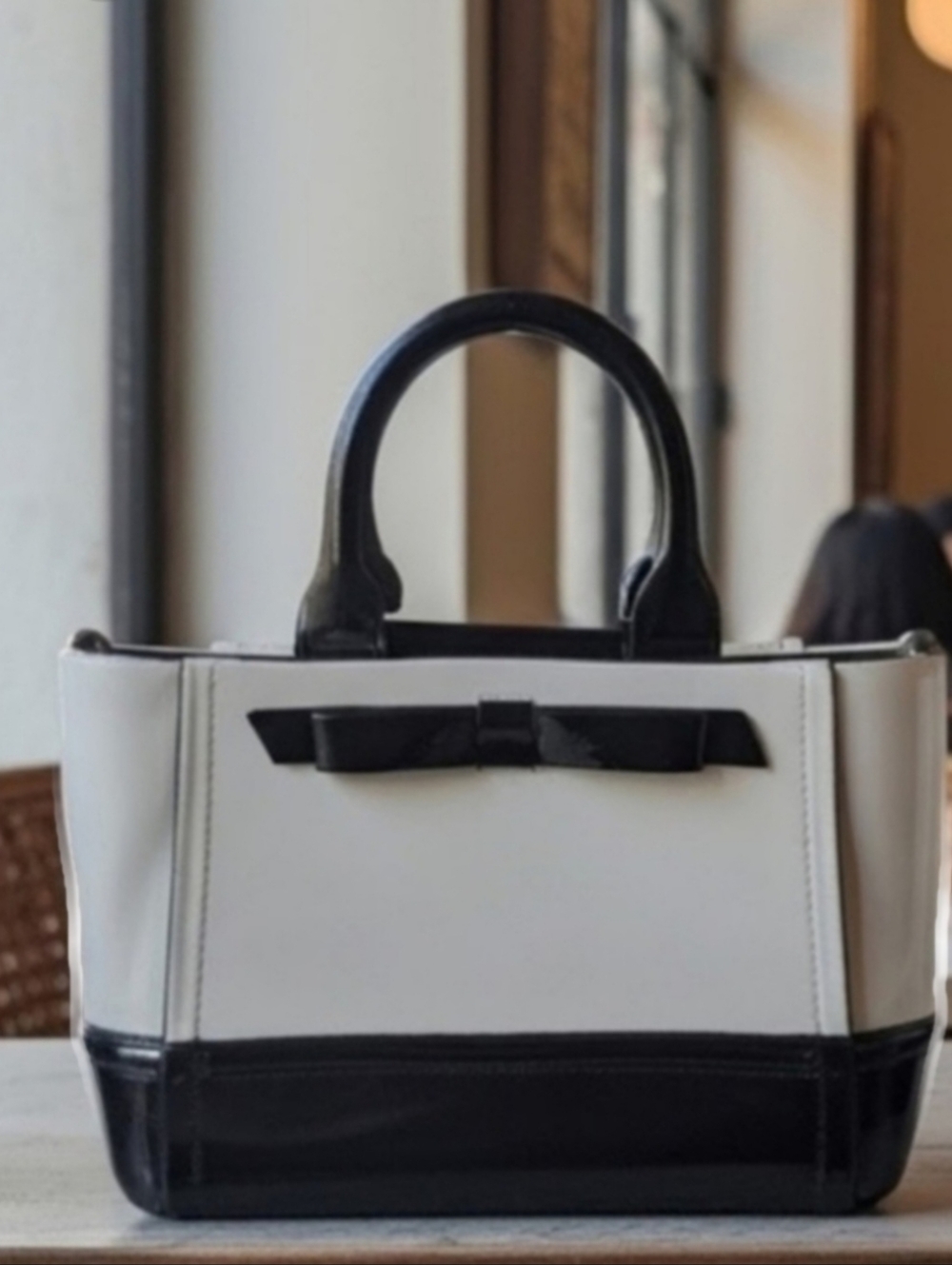 Classic KATE SPADE Two-Tone White and Black Tote Bag with Bow